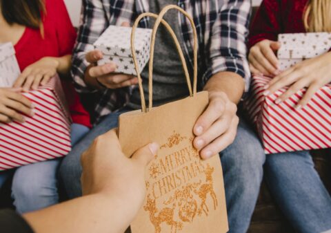 Christmas gifting concept with friends bag_