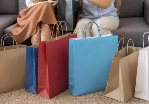 adult women checking shopping together